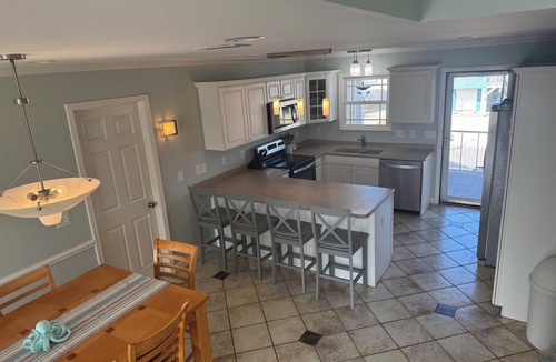 Ocean Isle Beach House | New Ocean Isle Rental. Canal Home 7BR/6BA - LOTS of outdoor living space.