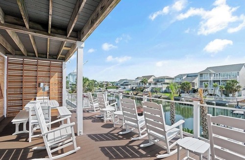 Ocean Isle Beach House | New Ocean Isle Rental. Canal Home 7BR/6BA - LOTS of outdoor living space.