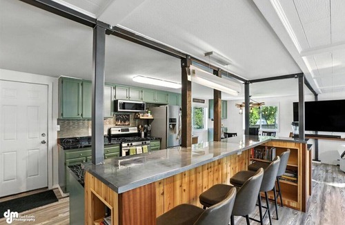 Mid-Hillside House | Once a 1950s Alaska Railroad Section House, this unique home blends modern comfort with vintage soul