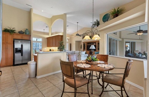 White Marsh House | Paradise Found - Enjoy sunny afternoons in this beautifully decorated pool home