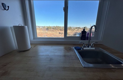 Monument Cabin | Peaceful container home with hot tub, sauna, AC