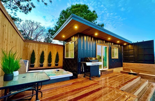 Monument Cabin | Peaceful container home with hot tub, sauna, AC