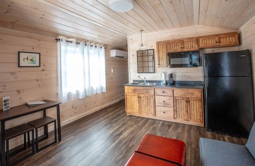 North Sebago Cabin | PHOEBE - RESORT WITH 12 PROPERTIES. NATURAL POND FOR SWIMMING.