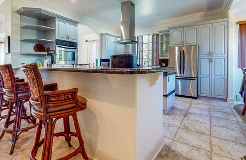 Loxahatchee House | Renovated, elegant retreat with a fitness room, work desks, large deck, & W/D