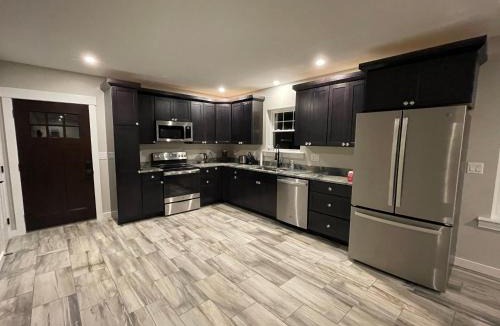 Bangor House | Riverside Getaway with HotTub 3br 2 bth