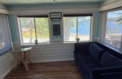 Standish Condo | Sebago Lake studio-style condo with enclosed sunroom and sunset views