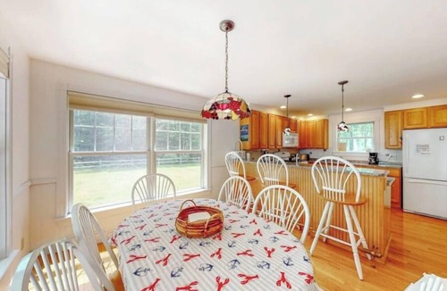 Ellsworth House | Secluded lakefront home with patio & firepit, fast WiFi, wood stove & W/D