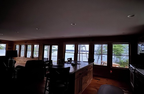 Steuben Cabin | Shoreline solitude, rustic, nestled between evergreens and Pigeon Hill Bay