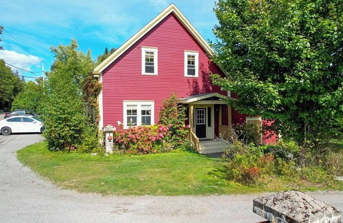 Saint Patrick Cottage | Spacious Loft Suite in Historic Carriage House w/Private Deck