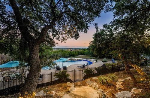 Coves On Lake Travis House | Spacious retreat, pool and hot tub within walking distance of Lake Travis.