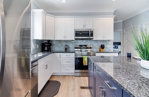 Tranquil Harbour House | Spectacular home with Pool, New 8 seater Golf Cart, elevator, with easy access to beach