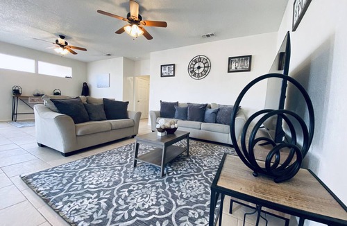 Midland Condo | String light condo with chic brick interior