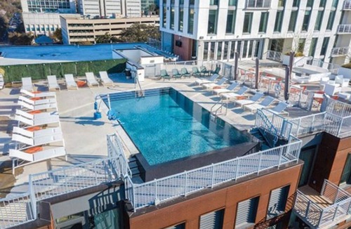 Civic District Condo | Studio unit/Austin - Full Kitchen, W/D, Rooftop Pool, & More!