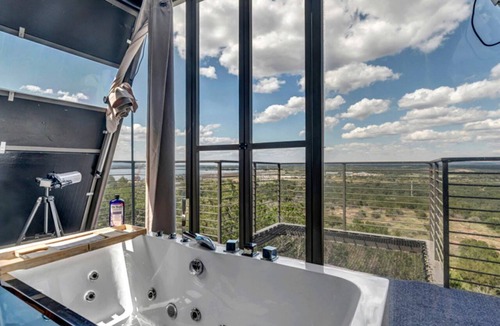 Cottonwood Shores Cabin | Stunning A-Frame with Folding Glass Walls & Open-Air Living in Cottonwood, Texas