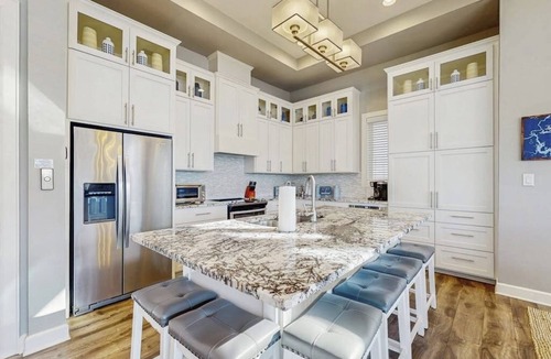 Kingsland House | Stunning lakefront home w/pickleball, shared pool & sand volleyball