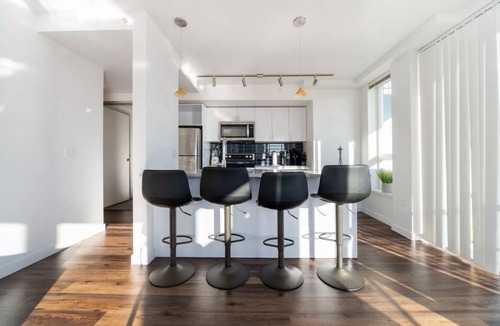 Wilburton Apartment | Stylish 2BR: City Views, Dual Workspaces & Gym Access