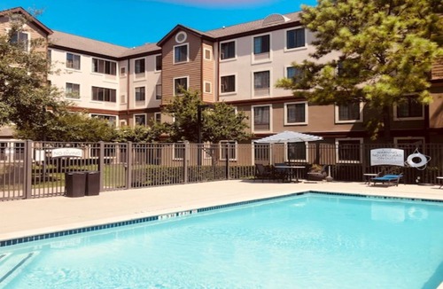 Energy Corridor Apartment | Suite with Pool Access, Free Shuttle, Buffet Breakfast + 24h Business Center