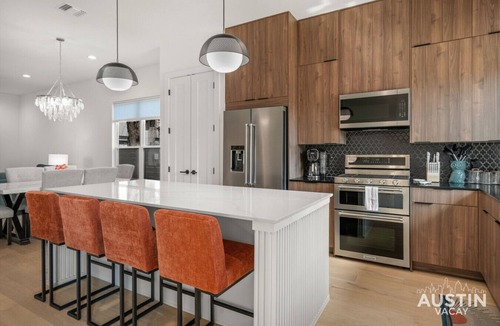 Central East Austin House | Swim, Sing & Stay | Modern Home w Heated Pool & Karaoke | Mins from Rainey & 6th