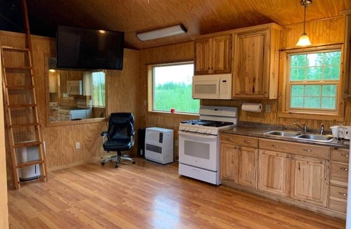 Houston House | The Airstrip Ranch: 3-Bedroom Cabin on 100 Acres