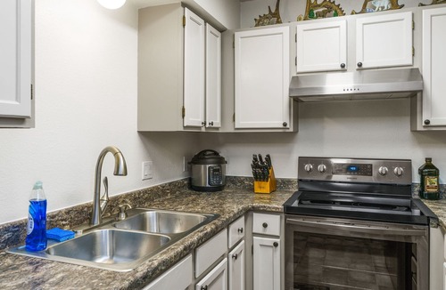 Sand Lake Apartment | The Moose Crossing : Close to Airport, Centrally Located with Garage