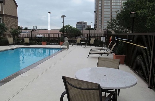 Vance Jackson Apartment | Two Comfortable 2BR Suites w/Full Kitchen | Outdoor Pool | Free Breakfast