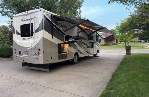 Galion House | Unique RV getaway with a private pickleball court, swim spa and shaded pavilion.