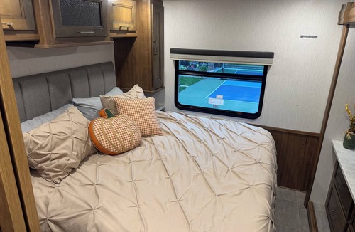 Galion House | Unique RV getaway with a private pickleball court, swim spa and shaded pavilion.