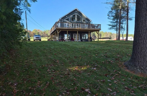 Hartford House | Unwind in lakeside luxury; your serene Bear Pond escape awaits.