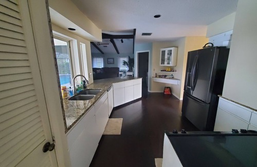 Venice House | Venice 3 Bedroom Waterfront Home with Pooled Lanai for short term rental