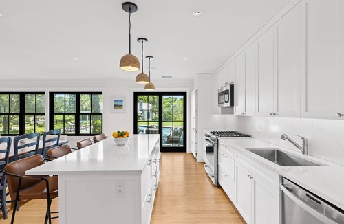 Quioque House | Westhampton Beach 4 bed/4 bath - large garden, heated gunite pool, dock on bay!