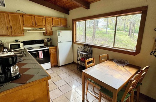New Braunfels House | Wondercove, 7 Rustic Cozy Cottages, Secluded & Sleeps up to 54, on Lake Dunlap