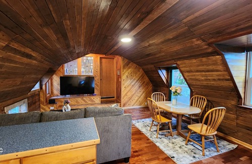 Womens Bay House | World War 2 Quonset Hut, River & Mountain Views, full kitchen & WiFi