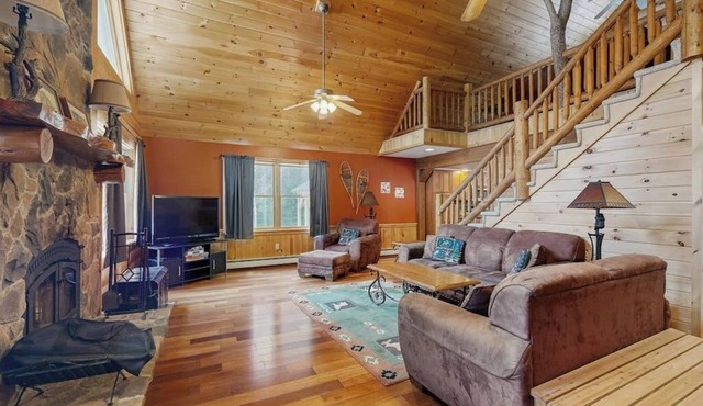 Beautiful log cabin with nearby skiing, large living spaces, and outdoor patio