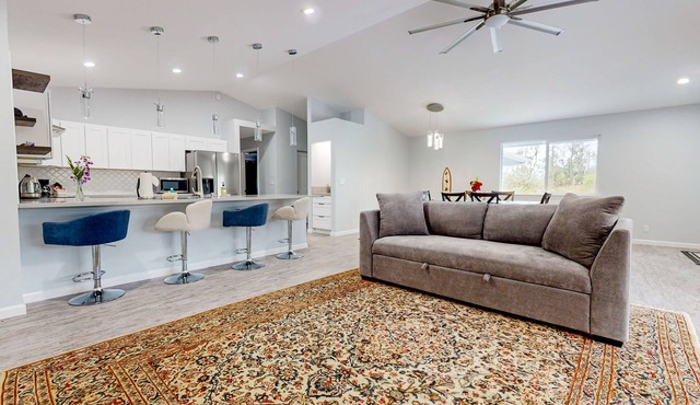 Bright & modern dog-friendly oasis on two lush acres with generous patio & W/D