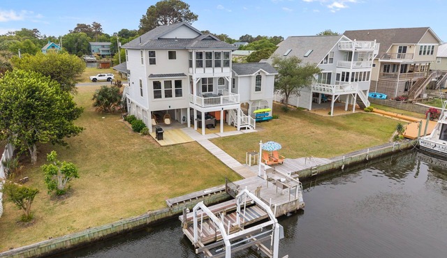 Canal-Front OBX Home w/Dock + Hot Tub/Kayaks/Paddleboards + Bring Your Boat!
