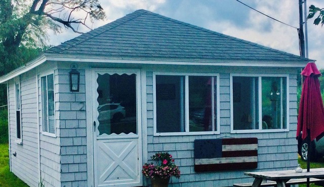 Cute cottage has everything you’ll need for a great stay at Pirates Cove beach.