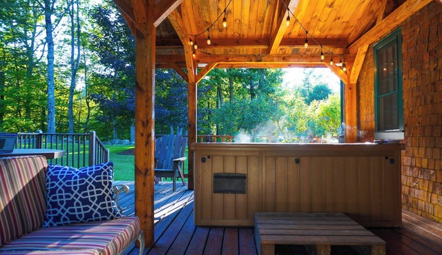 Escape to Central Escape’s 2-bedroom option, perfectly located in New Hampshire’s Lakes Region. Enjoy a private year-round hot tub, spacious backyard with yard games, and easy access to downtown Meredith, Squam Lake, and summer concerts.