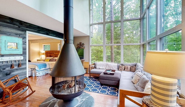 Exquisite waterfront home with balcony, fireplace, W/D, & dog-friendly