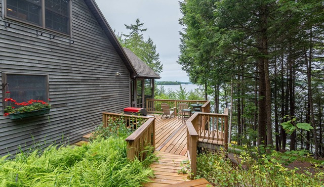 Gorgeous lakefront home w/dock, canoe, kayaks & lake/forest views