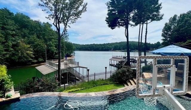 Gorgeous lakefront home with infinity pool, pickleball court, stunning lake view