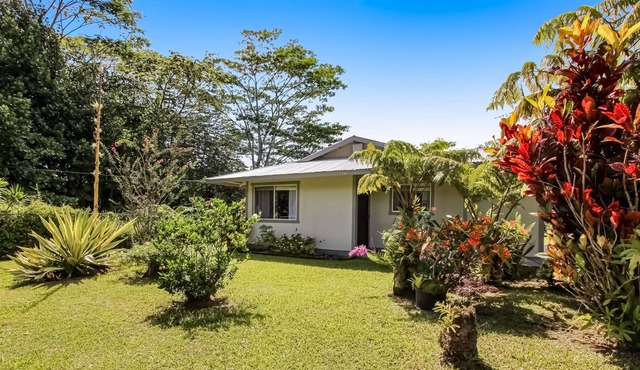 Ground-floor dog-friendly home with patio, gazebo, washer/dryer, & garden views