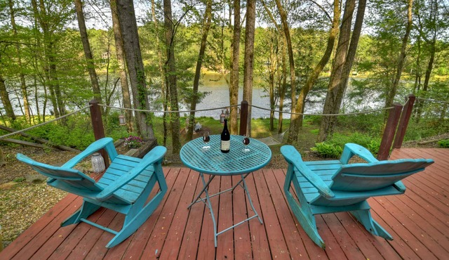 Lakeside Cabin w/mountain views, dock, fire pit, hot tub, and much more!