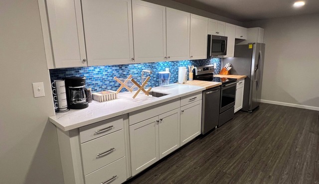 New 2-bedroom Apt on 2.5 forested acres close to airport, downtown, and trails.