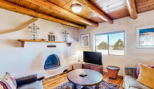 Restored 1938 adobe with mountain view & kiva fireplace - dog-friendly