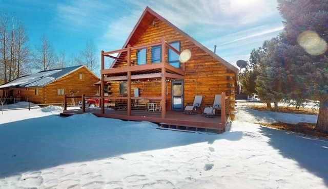 Riverfront home with river & valley views, wood stove, deck, & W/D