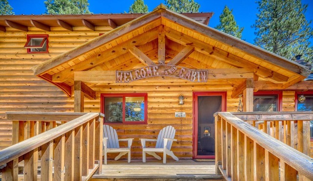 Slice of heaven! Log home w/huge deck & outstanding views on 7 acres w/creek