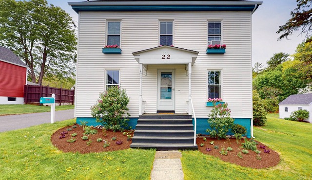 Updated, dog-friendly home with two living areas, firepit, washer/dryer, & patio