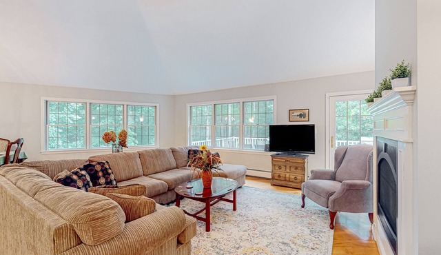 Waterfront home with a fireplace, grill, deck, washer/dryer, & AC - dog-friendly