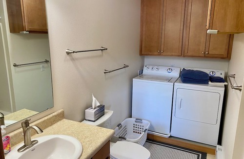 Juneau Apartment | Sunny apartment near a lake, great walking trails, and a playground on site.